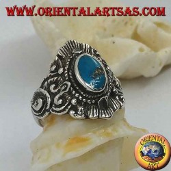 Silver ring with oval turquoise and Nepalese-style decorations