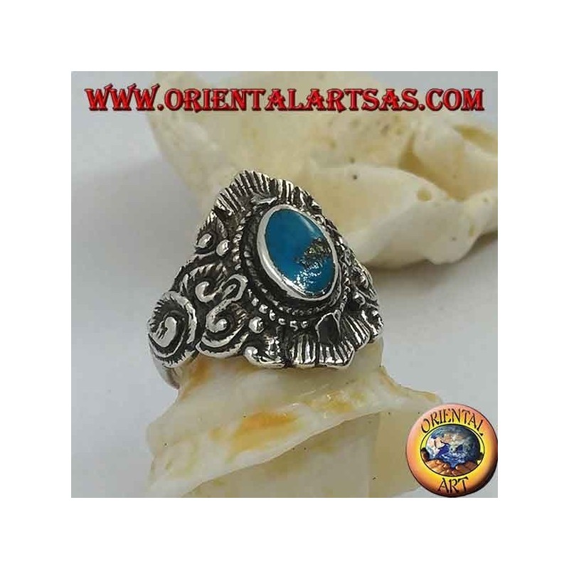 Silver ring with oval turquoise and Nepalese-style decorations
