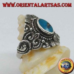 Silver ring with oval turquoise and Nepalese-style decorations