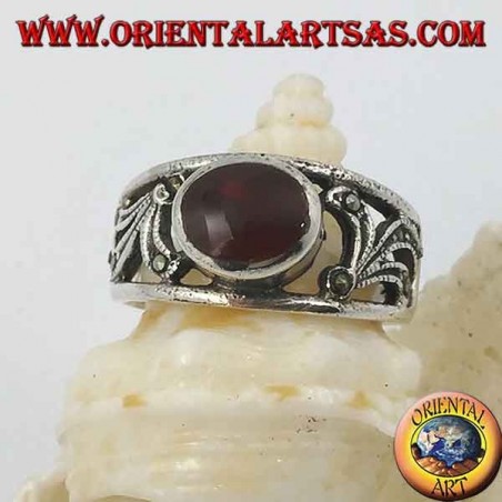 Silver ring with horizontal oval carnelian and floral decoration perforated with marcasite