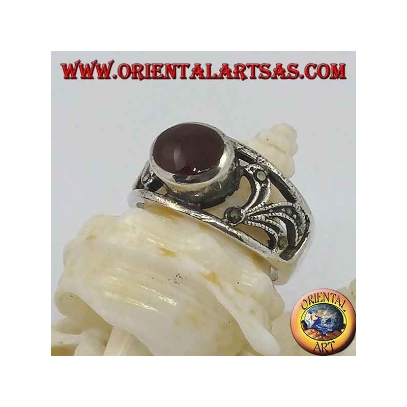 Silver ring with horizontal oval carnelian and floral decoration perforated with marcasite