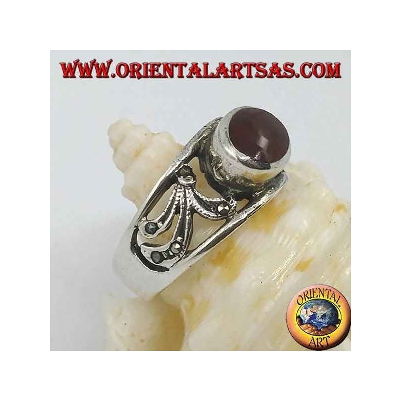 Silver ring with horizontal oval carnelian and floral decoration perforated with marcasite