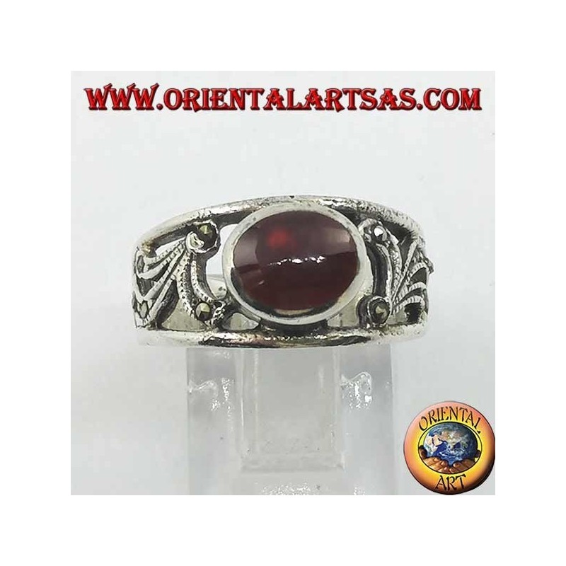 Silver ring with horizontal oval carnelian and floral decoration perforated with marcasite