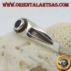 Silver ring with round onyx and thick bas-relief line on the sides