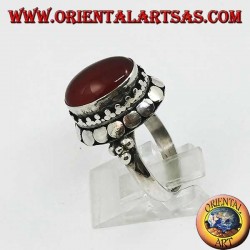 Silver ring with high edge with oval cabochon carnelian
