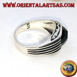 Silver ring with faceted oval green zircon and high relief stripes