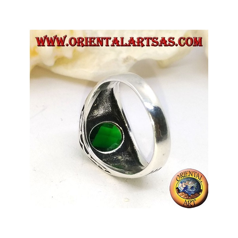 Silver ring with faceted oval green zircon and high relief stripes