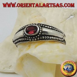 Silver ring with horizontal oval garnet and balls decoration