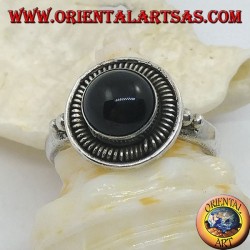 Silver ring with round cabochon onyx surrounded by stripes