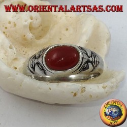 Silver ring with horizontal oval carnelian and tragedy masks on the sides