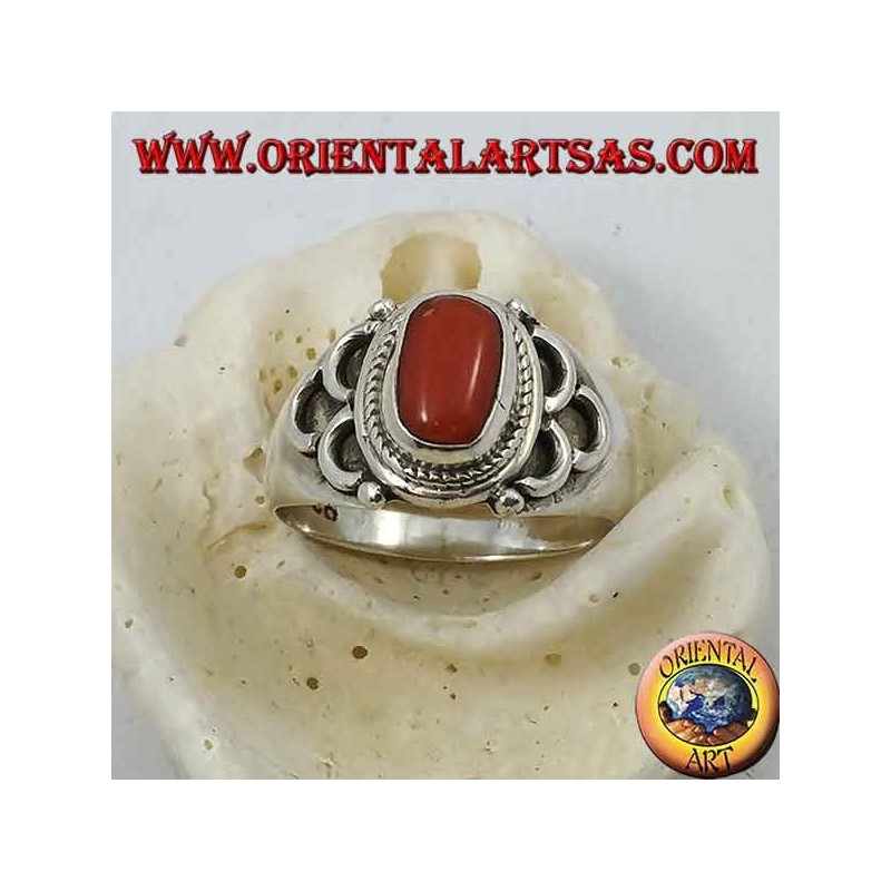 Silver ring with oval natural coral of ancient Tibetan origin with semicircles on the sides