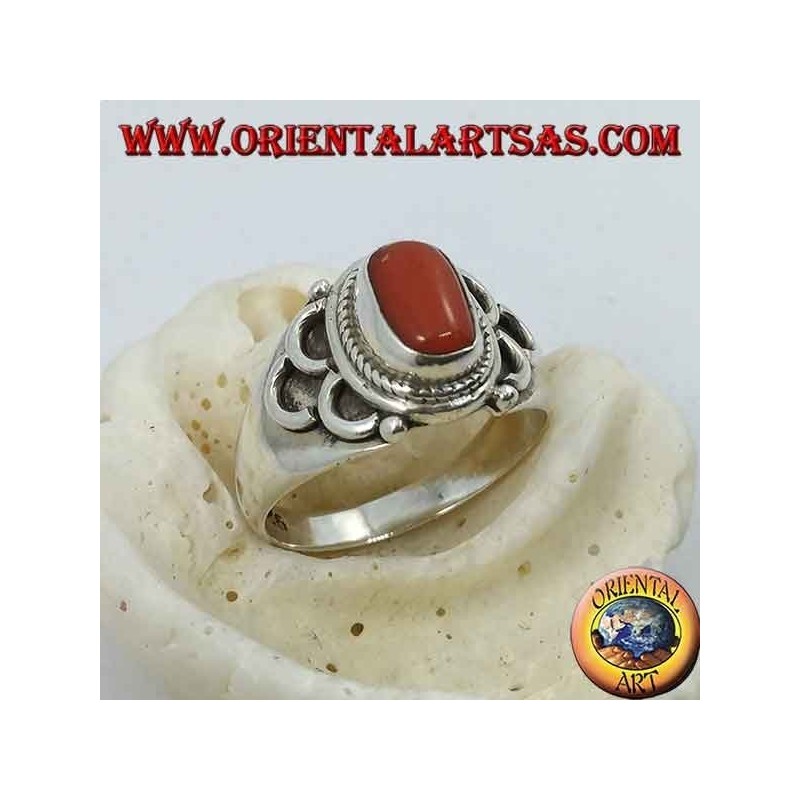 Silver ring with oval natural coral of ancient Tibetan origin with semicircles on the sides