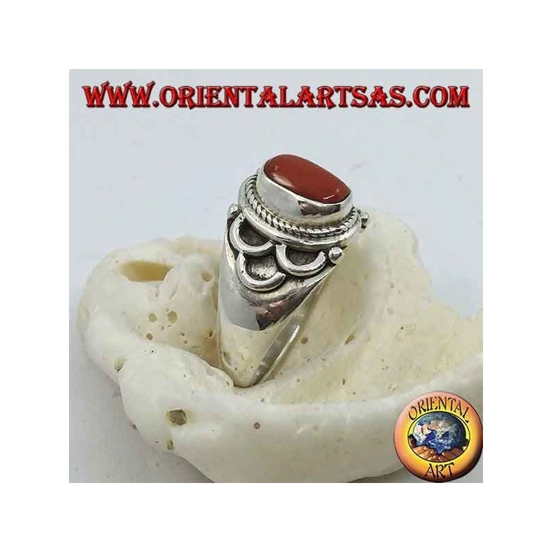 Silver ring with oval natural coral of ancient Tibetan origin with semicircles on the sides