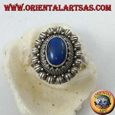 Silver flower ring with oval cabochon lapis lazuli