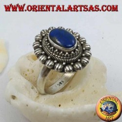 Silver flower ring with oval cabochon lapis lazuli