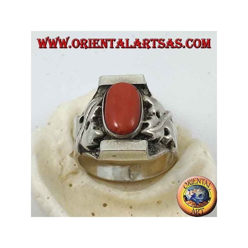 Silver ring with antique Tibetan oval coral and Nepalese setting with bay leaves on the sides