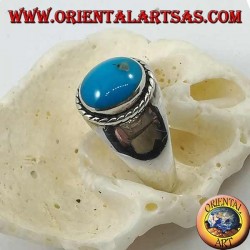 Silver ring with oval cabochon turquoise surrounded by a braid