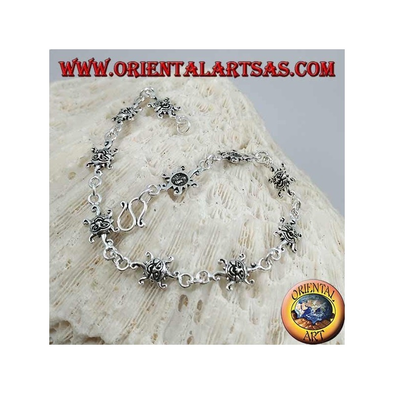 Bracciale in argento morbido con sole con volto inciso