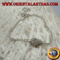 Soft silver bracelet with chain of hand of fatima with flower on the palm in the center