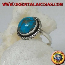 Silver ring with a round cabochon turquoise surrounded by a row of disks (16)