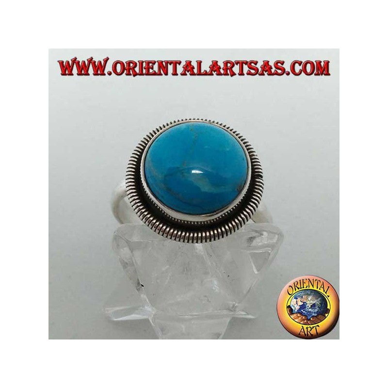 Silver ring with round cabochon turquoise surrounded by a row of disks (18)