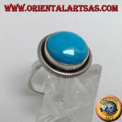 Silver ring with round cabochon turquoise surrounded by a row of disks (18)