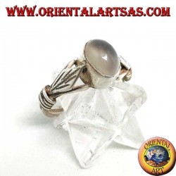 Silver ring with oval moonstone and rhomboid leaf with discs on the sides