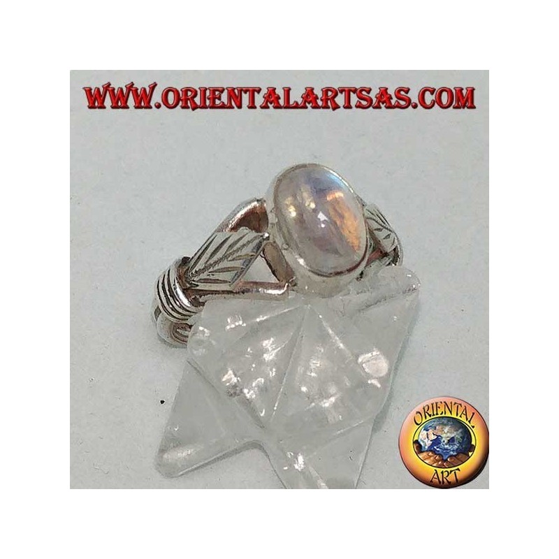 Silver ring with oval rainbow moonstone and rhomboid leaf with discs on the sides