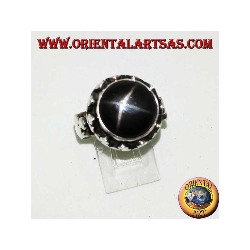 Silver ring with raised Black Star surrounded by disc clovers