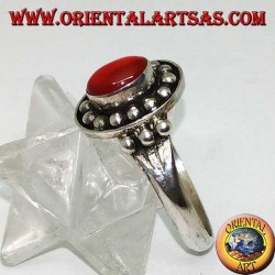 Oval cabochon carnelian silver ring on a high relief ball crown