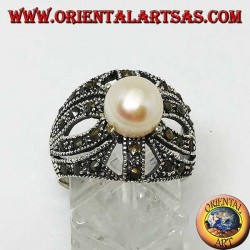 Silver ring with natural pearl set on an openwork cross frame studded with marcasite