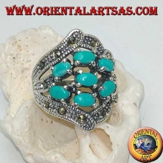 Anello in argento con sette turchesi ovali incastonati e marcassite