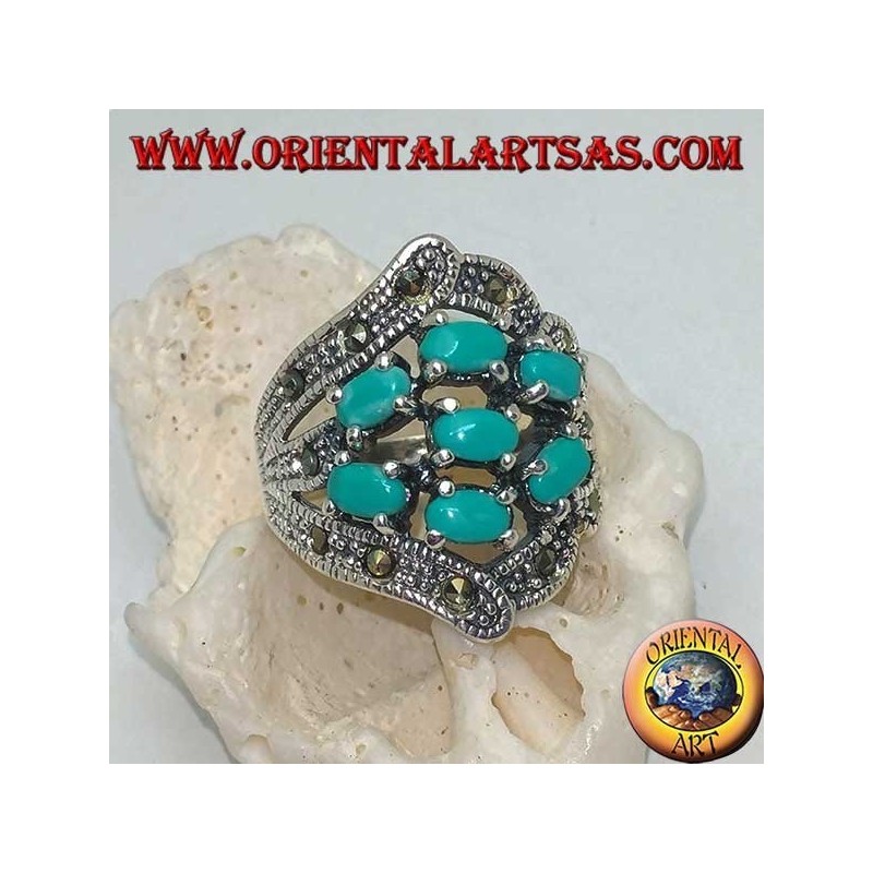 Anello in argento con sette turchesi ovali incastonati e marcassite