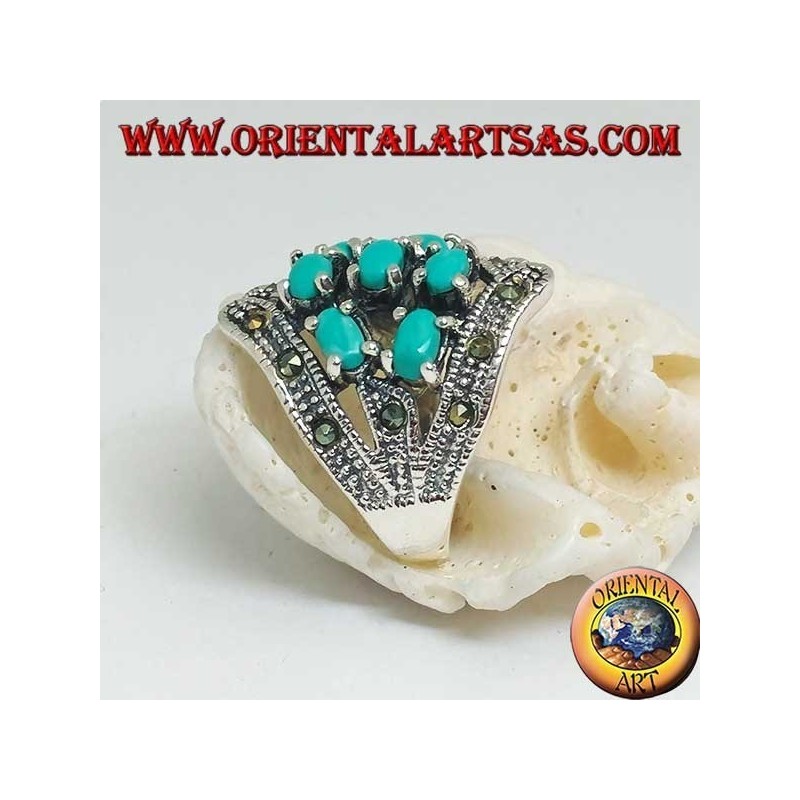Anello in argento con sette turchesi ovali incastonati e marcassite