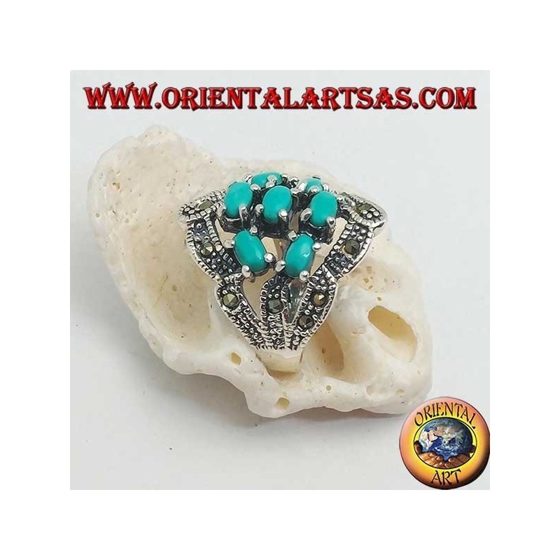 Anello in argento con sette turchesi ovali incastonati e marcassite