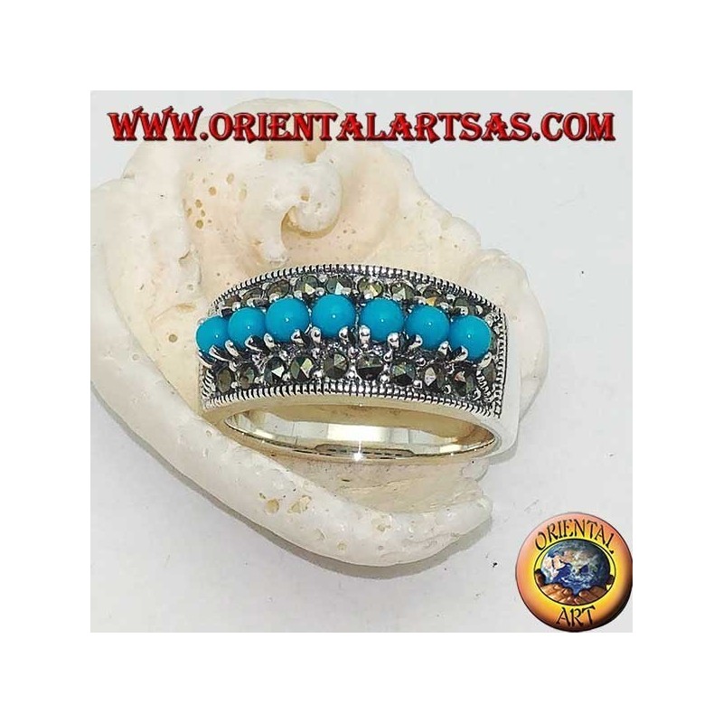 Band silberner Ring mit einer Reihe von türkisfarbenen Kugeln, umgeben von Markasit
