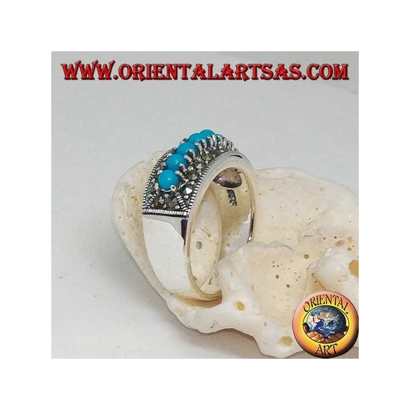 Bague en argent avec une rangée de boules turquoise entourée de marcassite