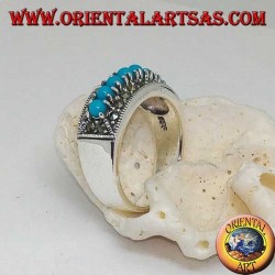 Anillo de plata con una hilera de bolas turquesas rodeadas de marcasita