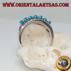 Anillo de plata con una hilera de bolas turquesas rodeadas de marcasita