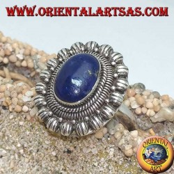 Silver flower ring with oval cabochon lapis lazuli
