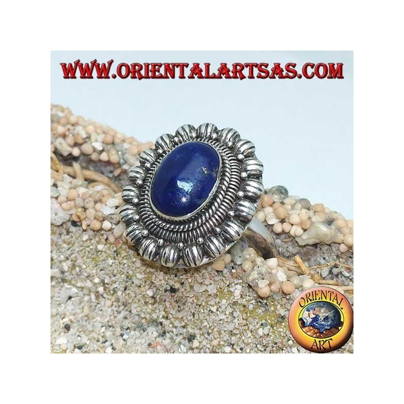 Silver flower ring with oval cabochon lapis lazuli