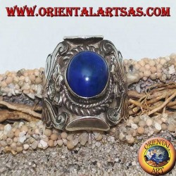 Silver ring with oval cabochon lapis lazuli and Nepalese setting with flower on the sides