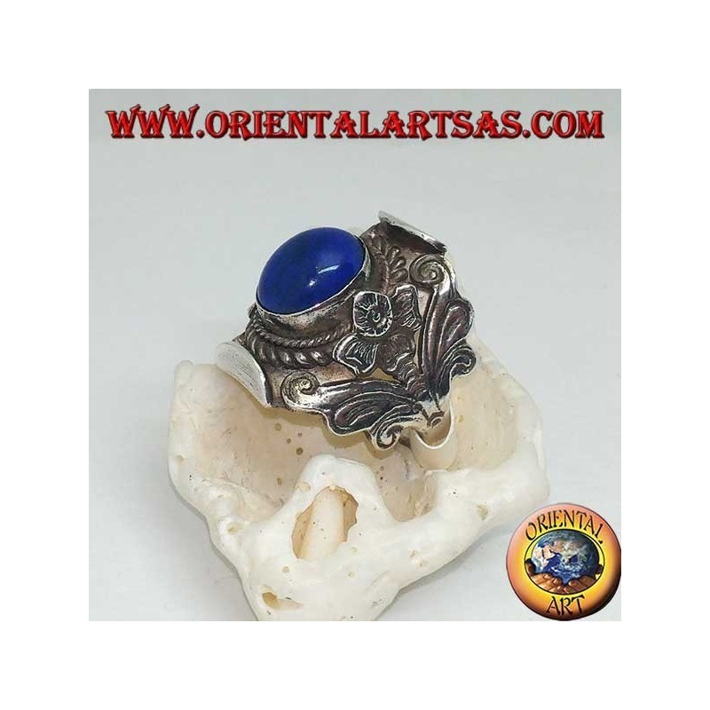 Silver ring with oval cabochon lapis lazuli and Nepalese setting with flower on the sides