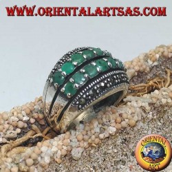 Silver ring with a rounded band with two rows of emeralds set between two rows of marcasites