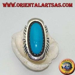 Silver ring with elongated oval turquoise on a smooth frame ruled on the sides