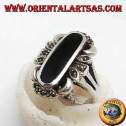 Silver ring with elongated oval onyx and decoration with marcasites on the 4 cardinal points