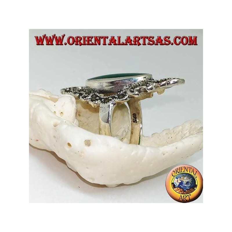 Silver ring with elongated oval green agate surrounded by a wavy line of marcasite