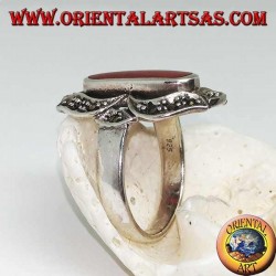Silver ring with oval carnelian lengthened in a marcasite eight