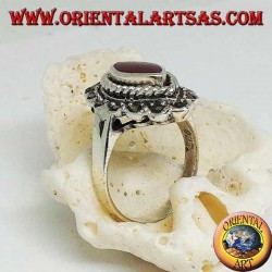 Bague en argent avec cornaline navette entourée d'une tresse et d'une rangée de marcassite