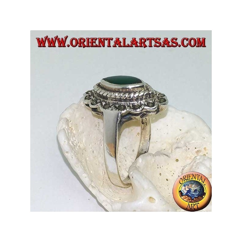 Silver ring with green shuttle agate surrounded by braid and a row of marcasite